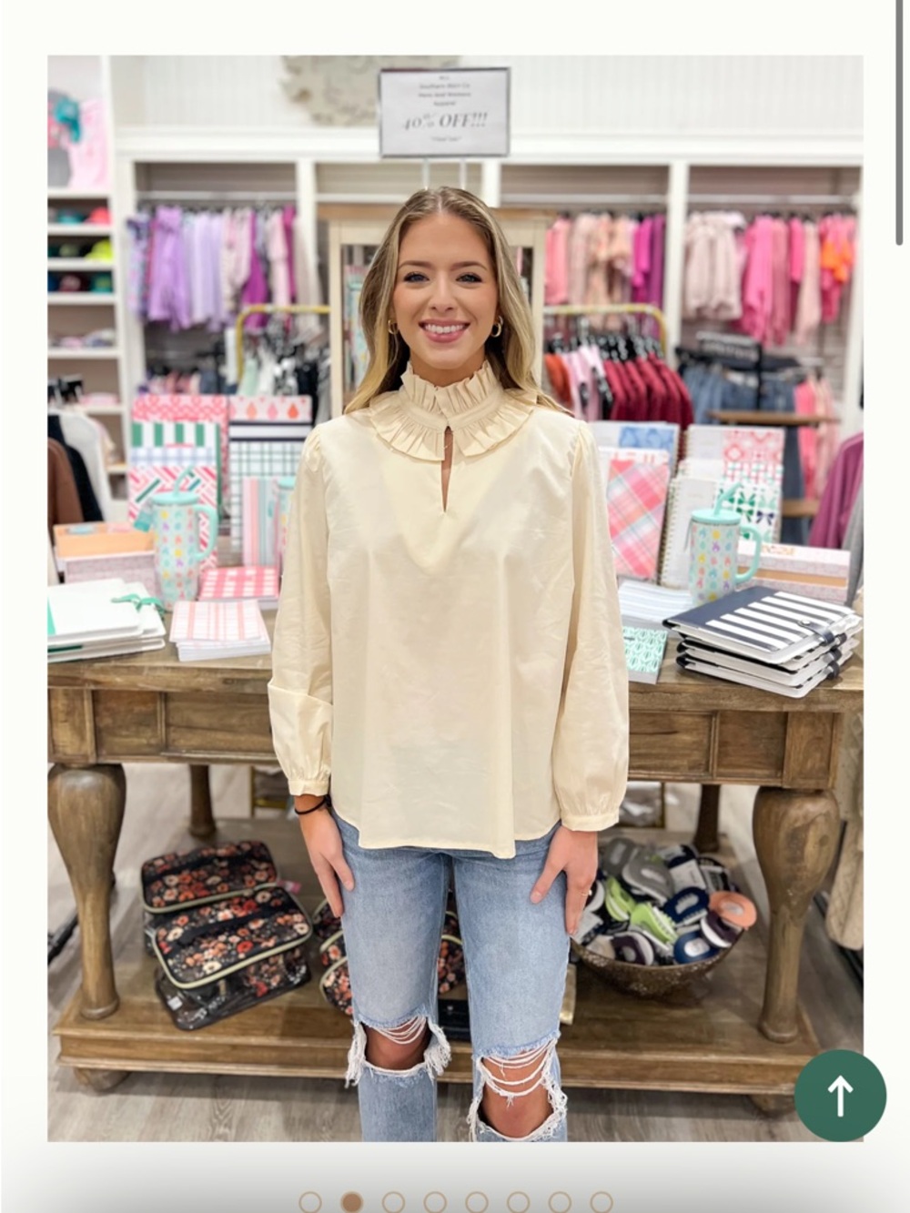 Karlie cream blouse with ruffled neck
Medium